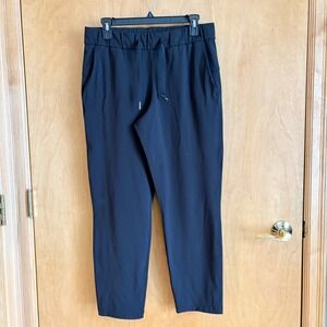 Lululemon On the Fly Pant Women 8 Navy Blue 7/8 Length Drawstring Tapered Jogger